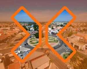 Vista aerea da cidade alaranjada com visão nítida somente dentro do grande X do logotipo da TRIX vazado.